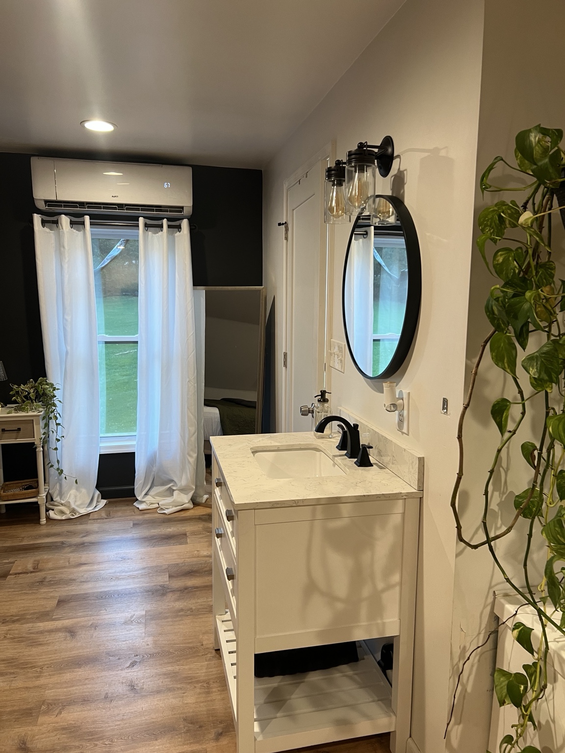 Vanity and window with mini-split climate control in the sleeping area
