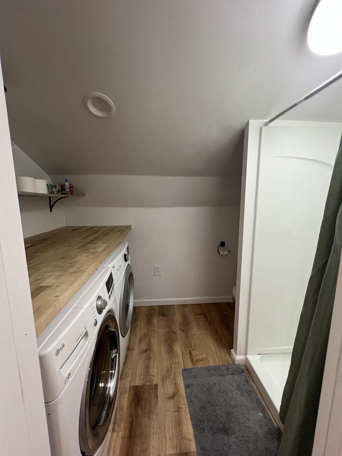 Private bathroom with walk-in shower and in-suite laundry